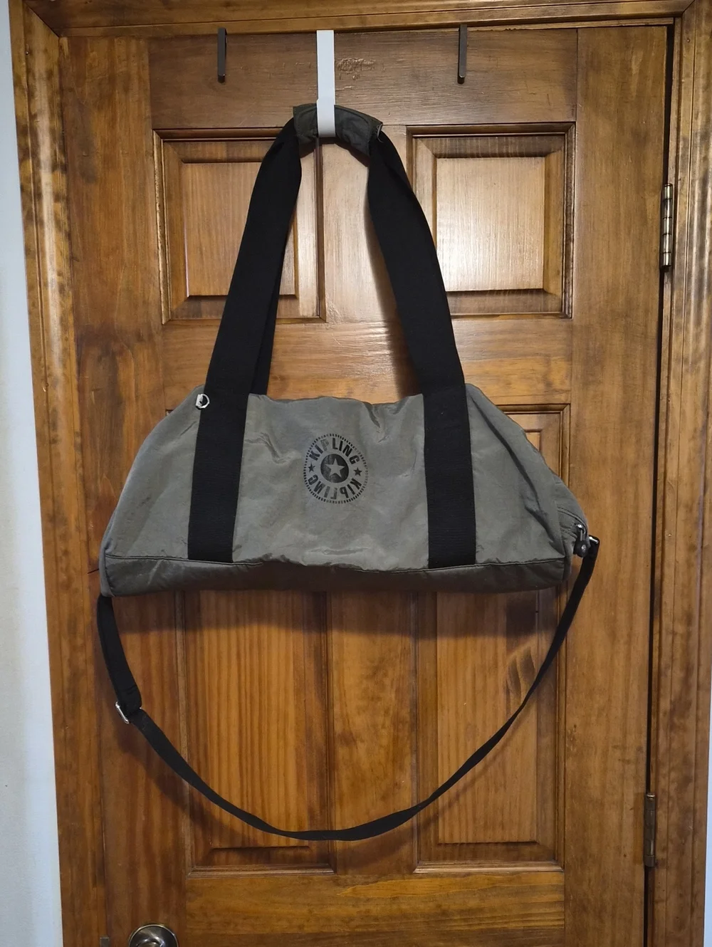 Kipling Women's Olive Canvas Duffel Bag with Black Straps